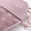 Holding a pink and black lace patchwork ice-feel sun protection breathable mask Application Scenario